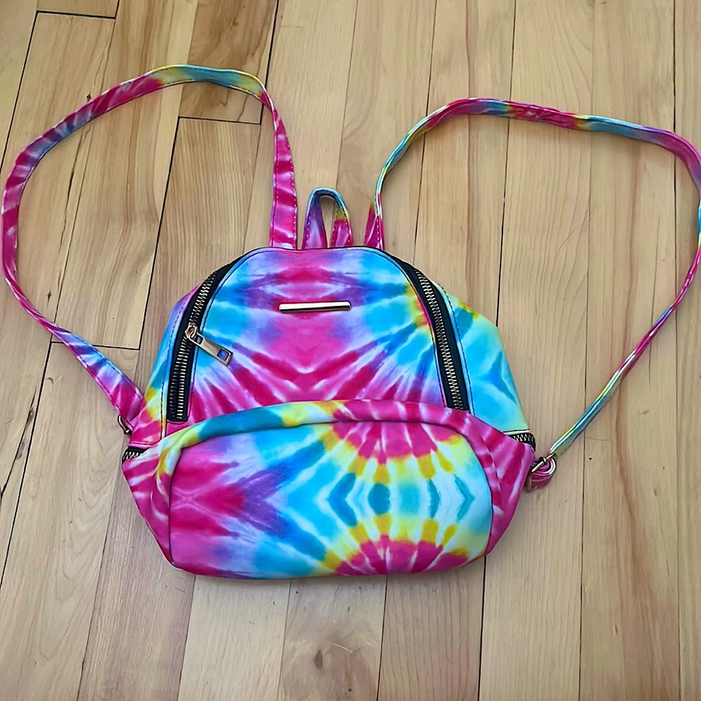 This is a tie dye bag it is small and it is a backpack.